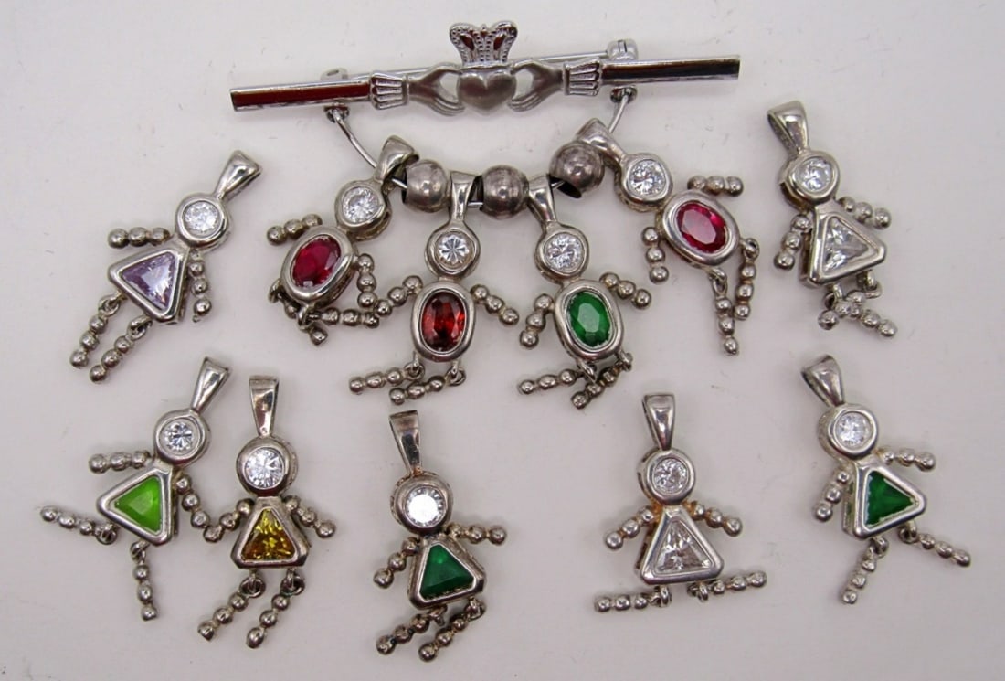 11 STERLING BIRTHSTONE BABIE CHARMS: 11 STERLING SILVER BIRTHSTONE BABIE CHARMS PLUS A PIN, 17.8 DWT