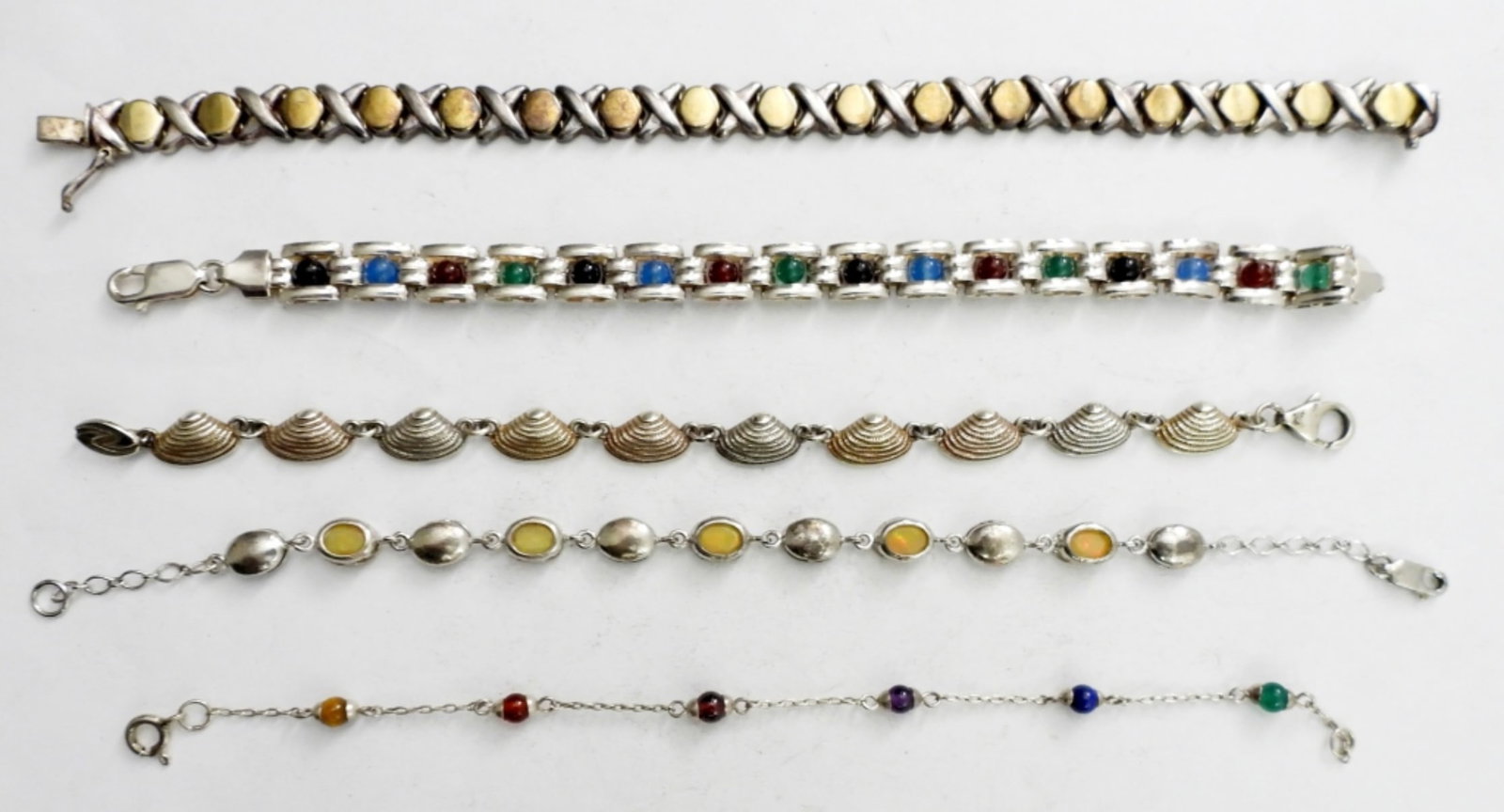 (5) STERLING FASHION BRACELETS: MOSTLY 7" LONG (27 DWT)