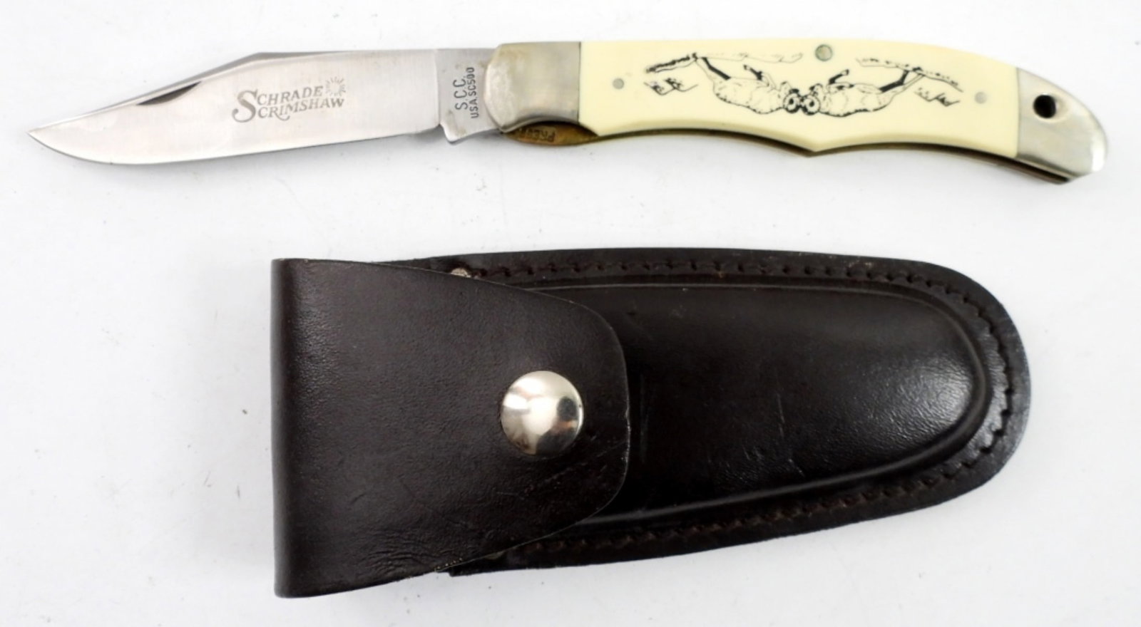 SCHRADE SCRIMSHAW "RAMS" SC500 KNIFE: SINGLE BLADE LOCK BACK - LOOKS UNUSED in LEATHER SHEATH