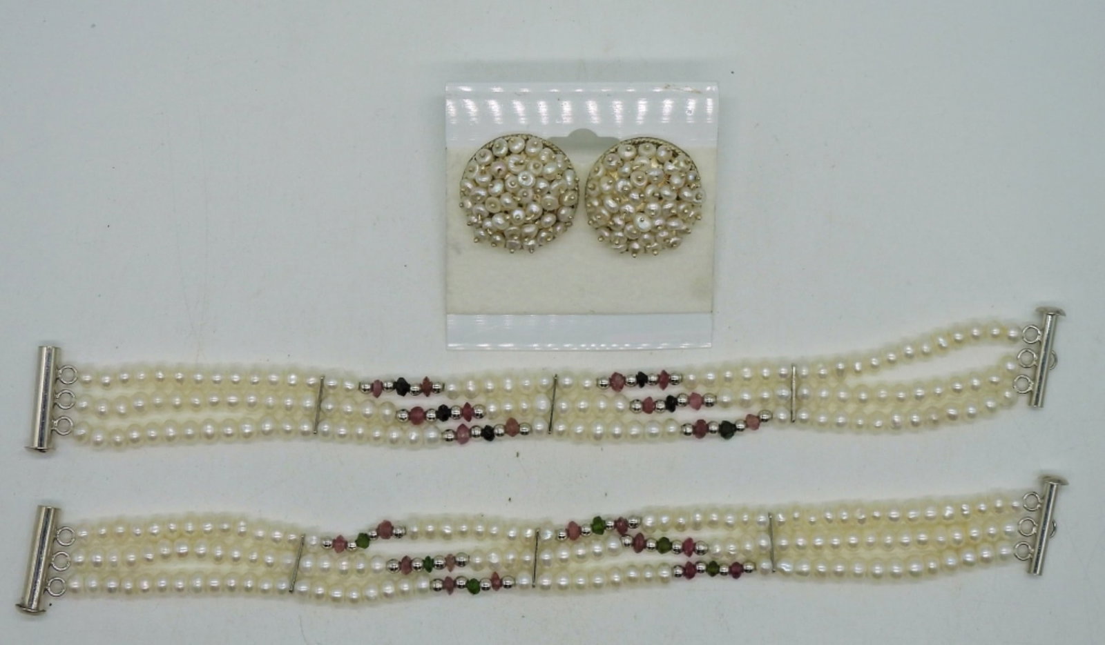 SEED PEARL BRACELETS & EARRINGS: Two Seed Pearl Bracelets with natural gemstone beads and sterling clasps, 8". One pair of seed pearl earrings in a silver tone setting.