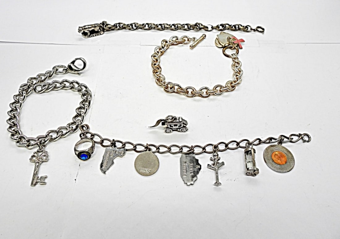 FASHION CHARM (4) CHARM BRACLETS: (4) ASORTED CHARM BRACLETS AND EXTRA CHARM