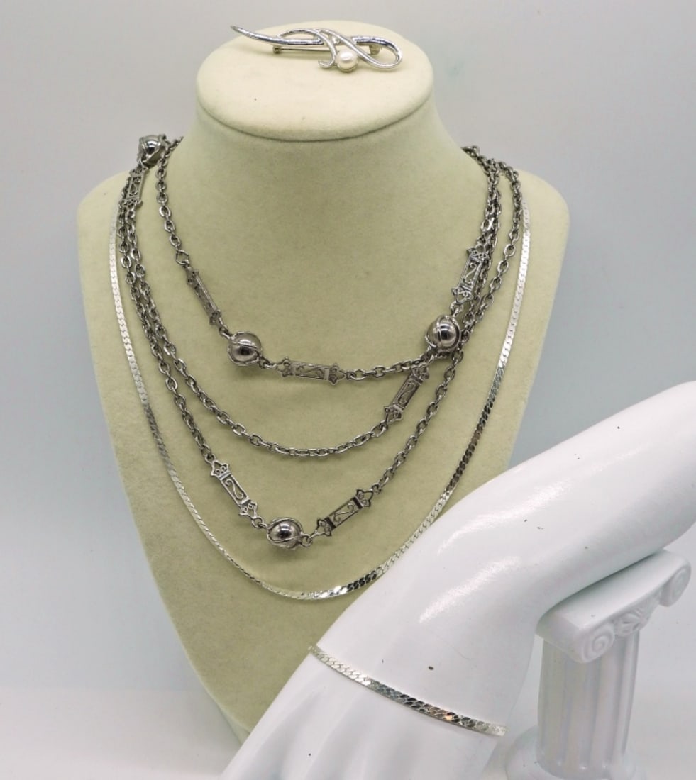 Silver tone Fashion Necklaces & More: Two Silver Tone Fashion Necklaces with a bracelet and Brooch with Pearl. 20" Chain, Matching 7" bracelet. 54" Fashion Necklace. Brooch is 2 1/4".
