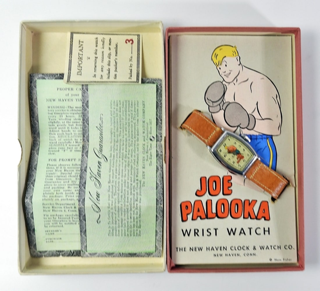 JOE PALOOKA CHARACTER WATCH- NEW!!: BY NEW HAVEN. UNWORN WITH DISPLAY BOX. ORIGINAL STRAP, INSTRUCTIONS, AND WARRANTY PAMPHLETS.