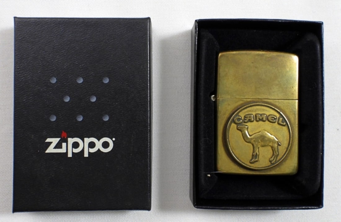 1992 BRASS STANDING CAMEL MEDALLION ZIPPO: 1992 BRASS STANDING CAMEL MEDALLION ZIPPO, ( SEAL IS BROKEN, UNFIRED) IN ZIPPO BOX