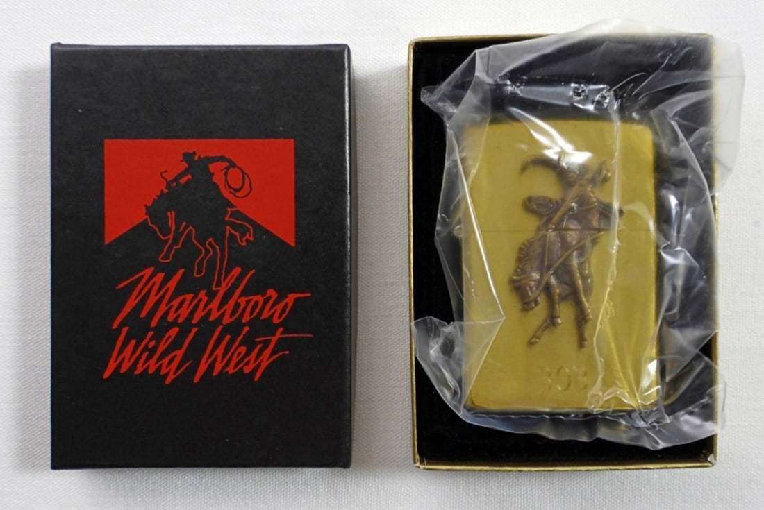 1992 BRASS MARLBORO BUCKING BRONCO ZIPPO: 1992 BRASS MARLBORO WILD WEST BUCKING BRONCO ZIPPO IN ORIGINAL BOX,( UNFIRED) IN BOX (ENGRAVED BOB)