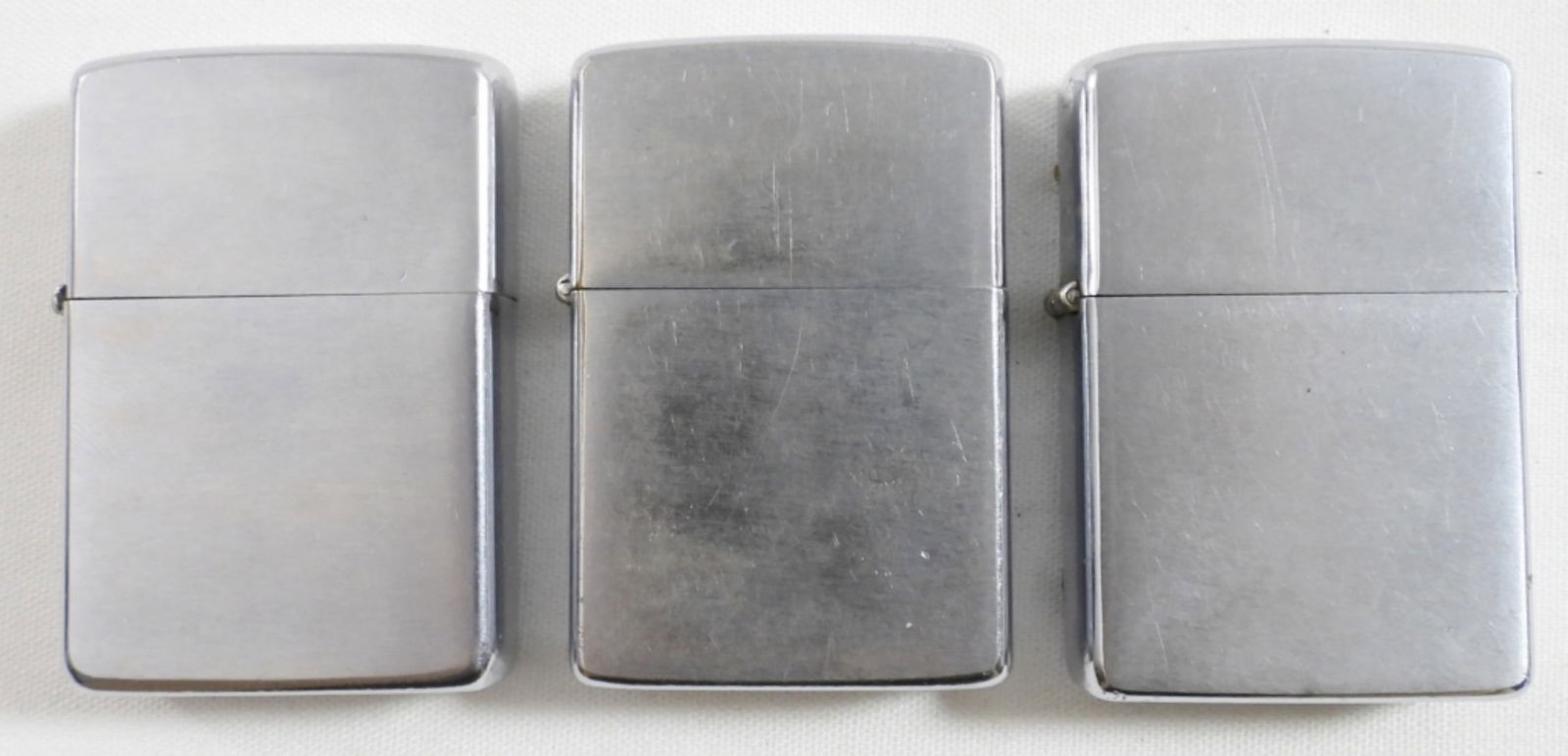 (3) SILVERTONE VTG ZIPPO LIGHTERS (1 of 4)