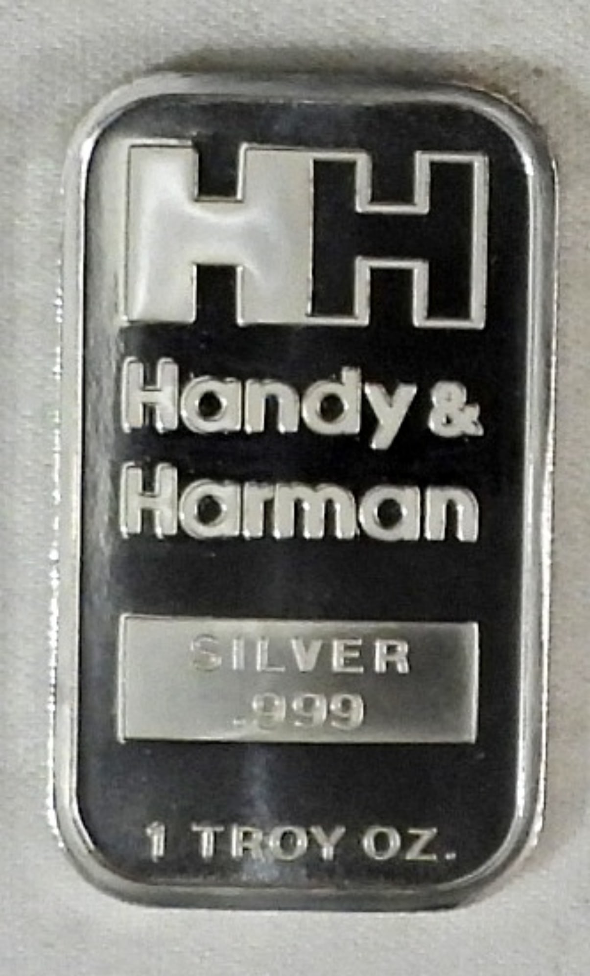 1OZ TROY HANDY& HARMAN .999 SILVER BAR: 1990 HANDY& HARMAN PHOENIX GRAND OPENING 1OZ TROY HANDY& HARMAN .999 SILVER BAR