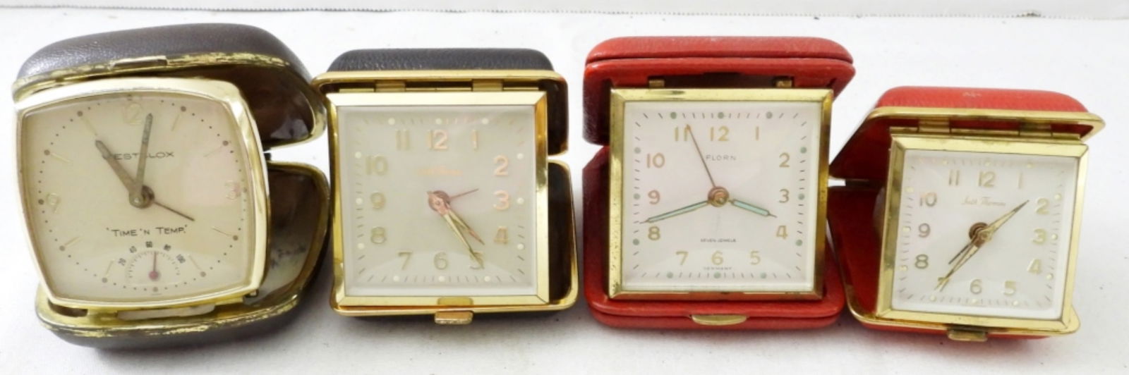 (4) TRAVEL ALARM CLOCKS (1 of 2)