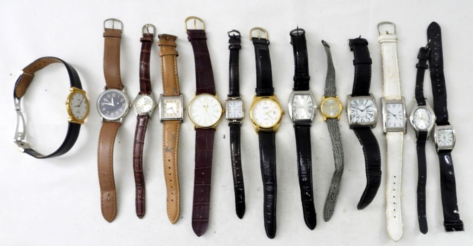 (14) LEATHER BANDED WOMENS WATCHES: FOURTEEN WOMENS WATCHES WITH LEATHER BANDS. GUESS, CHRISTIAN DIOR, PRECISION & MORE -NOT TESTED AS TO WORKING OR NOT-