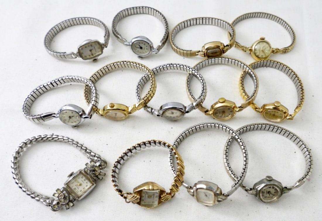 13 STRETCH BAND WOMENS WATCHES: UNTESTED, SILVER AND GOLD TONE, SOME BRANDS INCLUDE TIMEX, BRANTON, CORNELL, RODANIA, CARAVELLE