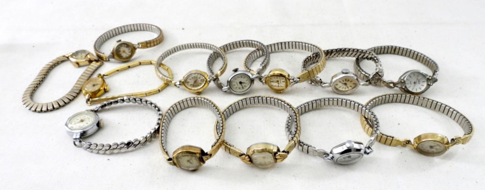 13 WOMENS STRETCH WATCHES: UNTESTED, JERRAL, COLLEZIER, TIMEX, LOUVIC, CARAVELLE, HELBROS AND MORE, GOLD AND SILVER-TONE
