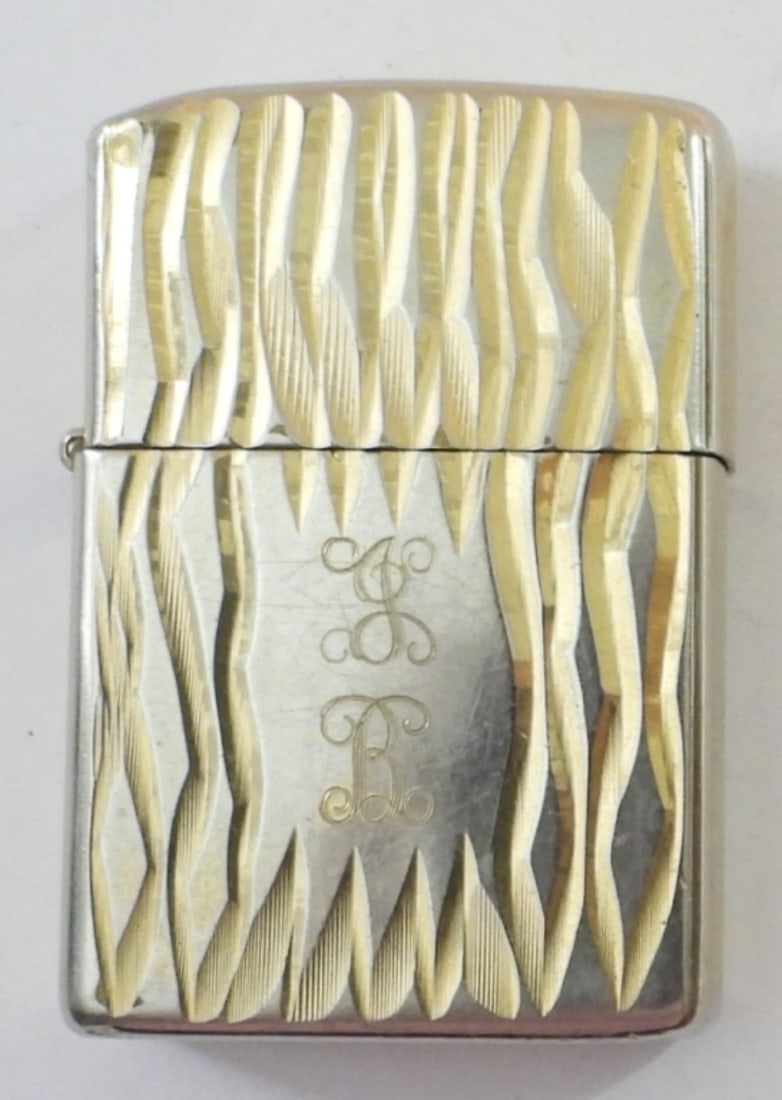 1979 FIRED GOLDEN ELEGANCE ZIPPO: 1979 FIRED GOLDEN ELEGANCE VERTICAL BARK ZIPPO. ENGRAVED