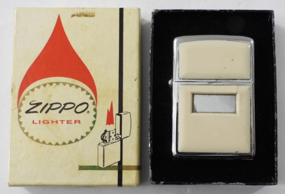 1979 FIRED CHROME AND WHITE ENAMEL ZIPPO: 1979 FIRED CHROME AND WHITE ENAMEL ZIPPO, IN ORIGINAL BOX