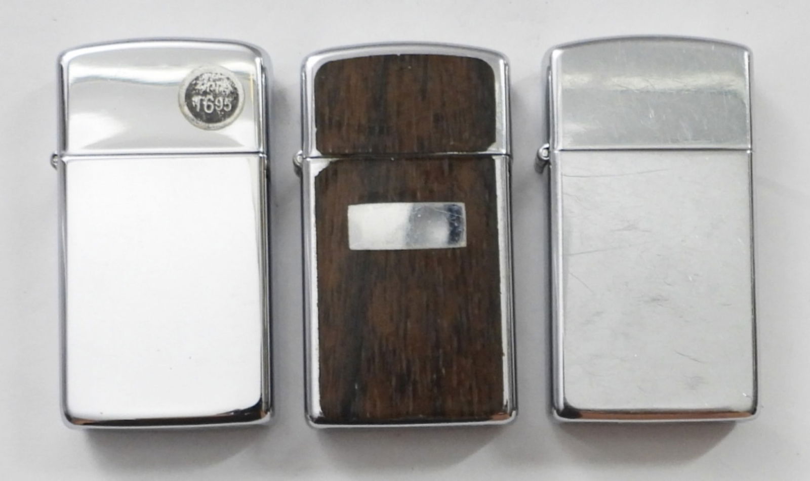 (3) SLIM ZIPPO LIGHTERS (1 of 4)