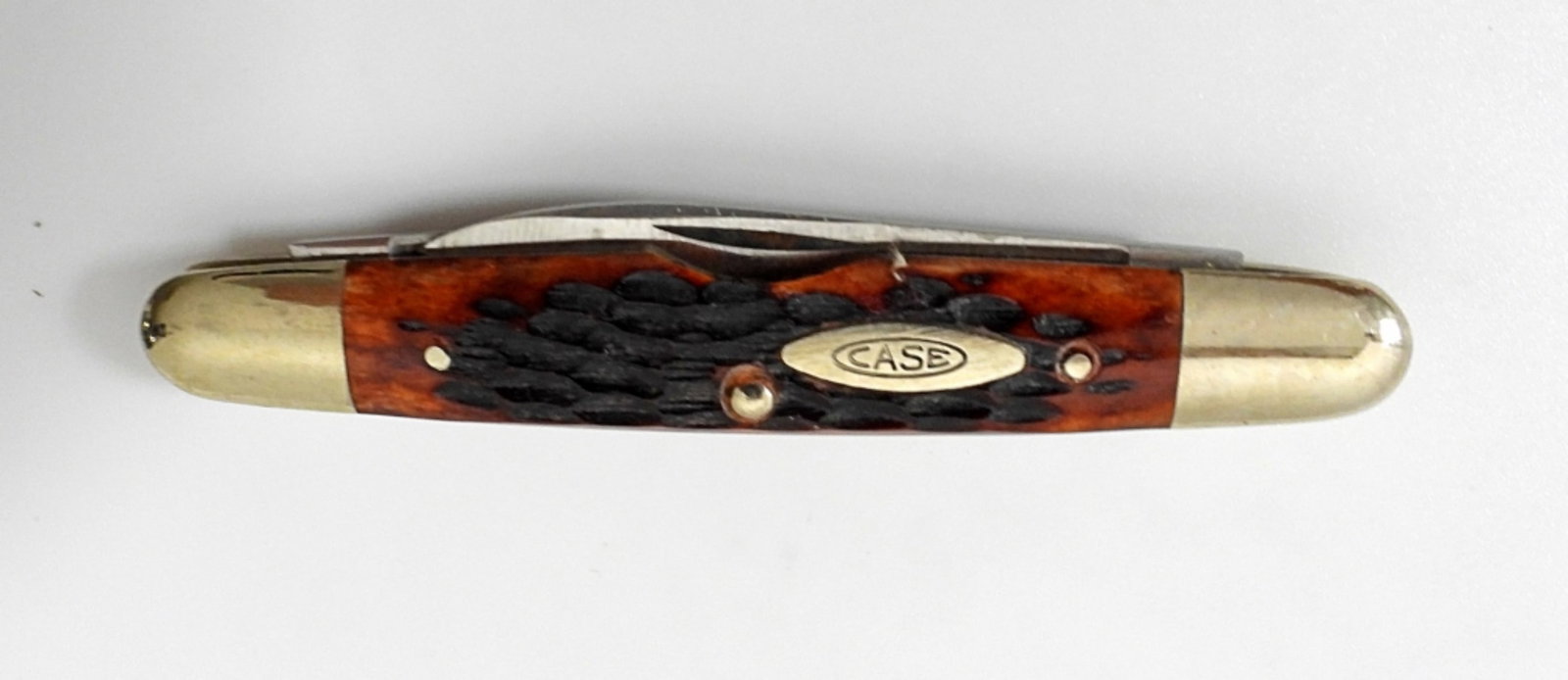 CASE XX 10 DOT 06263 SSP EISENHOWER: RED/BROWN BONE FOLDING KNIFE - LIKE NEW