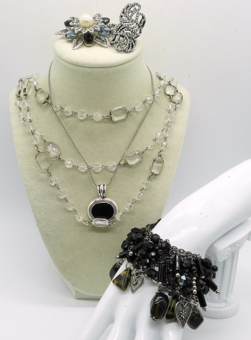 BLACK AND WHITE FASHION JEWELRY: TWO NECKLACES, 15" & 23". TWO BRACELETS WITH BLACK BEADS & GEMSTONES 8". ONE SILVERSTONE BROOCH WITH GEMSTONES, 2". ONE BLACK TONE RING WITH GEMSTONES, SIZE 7.5