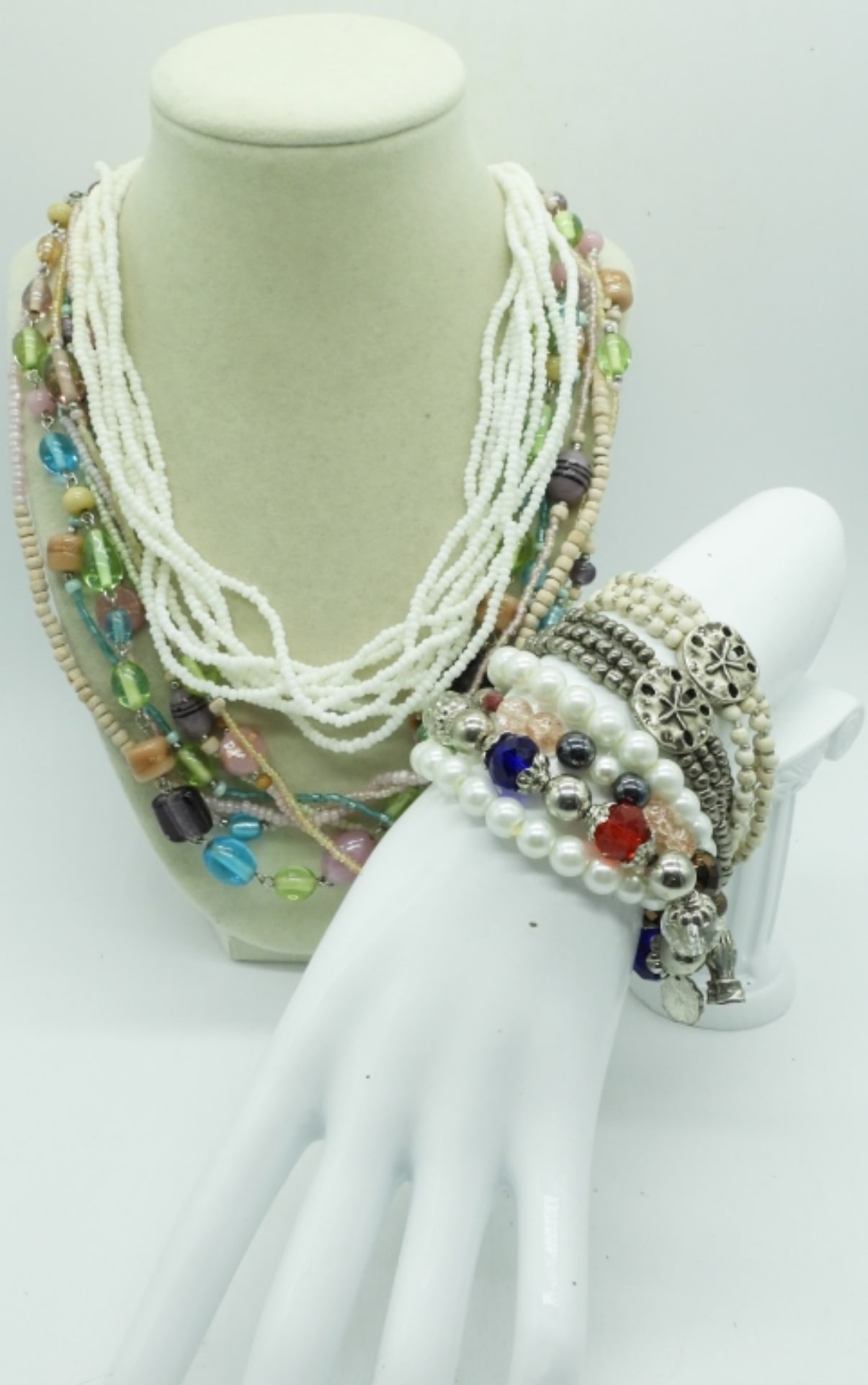 (8) BEADED NECKLACES & BRACELETS: TWO BEADED MULTI STRAND NECKLACES, 20-22". SIX BEADED STRETCHY BRACELETS.