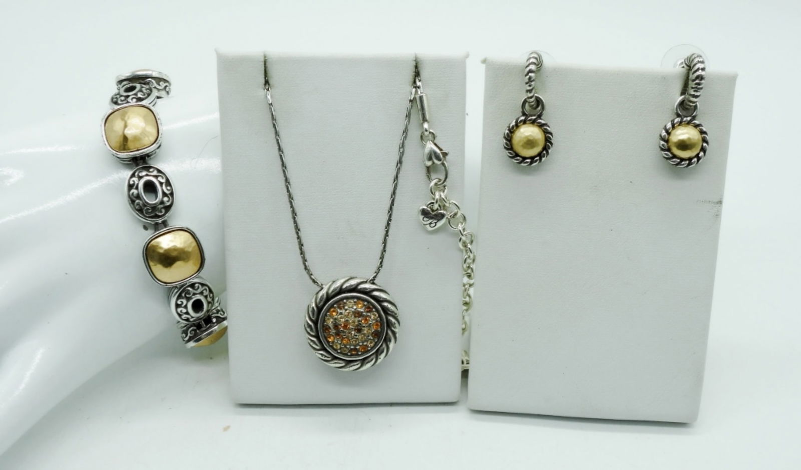 BRIGHTON SET OF 3-REVERSIBLE: BRIGHTON VENUS RISING BRACELET, 7-8". BRIGHTON REVERSIBLE NECKLACE & MATCHING EARRINGS. AMBER COLORED CRYSTAL GEMSTONES, HAMMERED GOLD ON THE OTHER SIDE. NECKLACE IS 16". PIERCED EARRINGS.