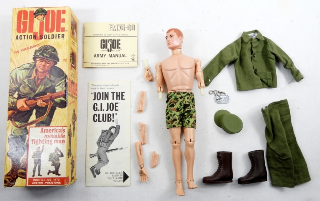 VINTAGE1964 GI JOE ACTION SOLDIER IN BOX: VINTAGE 1964 GI JOE ACTION SOLDIER, RED HAIR /BLUE EYES, WITH UNIFORM ,BOOTS ,HAT AND TAGS IN ORIGINAL BOX WITH PAPERS AND GI JOE ARMY MANUAL( HANDS ARE BROKEN BUT PIECES ARE IN BOX )