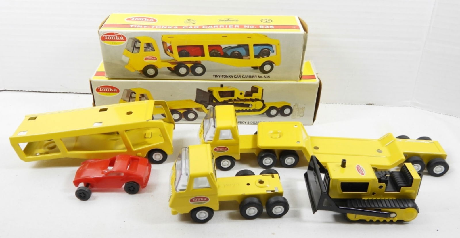 (2) TINY TONKA HAULERS in BOXES: CAR CARRIER No 635 with (1) CAR and LOWBOY/DOZER No 695 - BOTH LIKE NEW