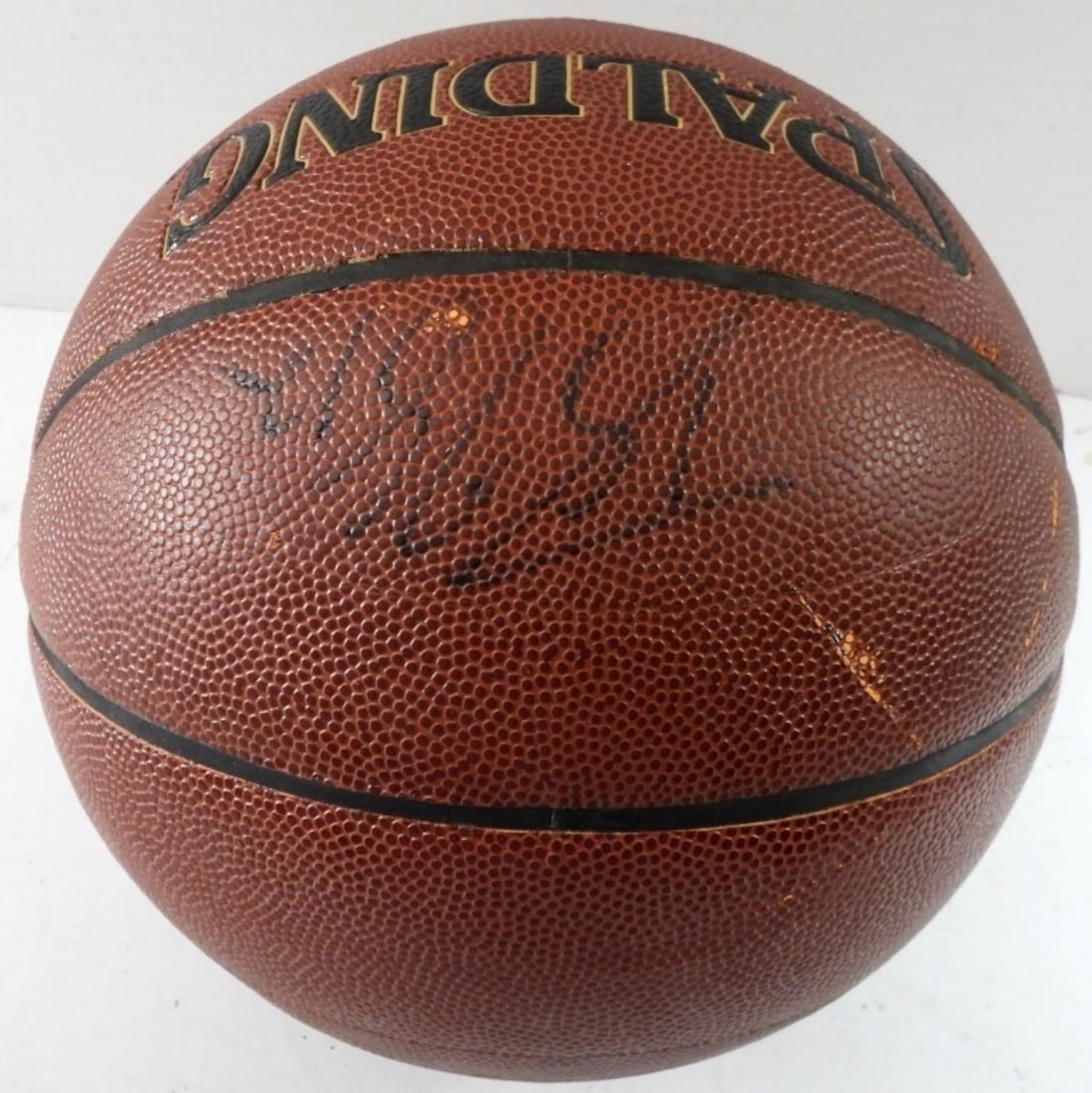 (1) UNIDENTIFIED AUTOGRAPHED BASKETBALL: NO COA, SPALDING NBA BALL, SOME WEAR