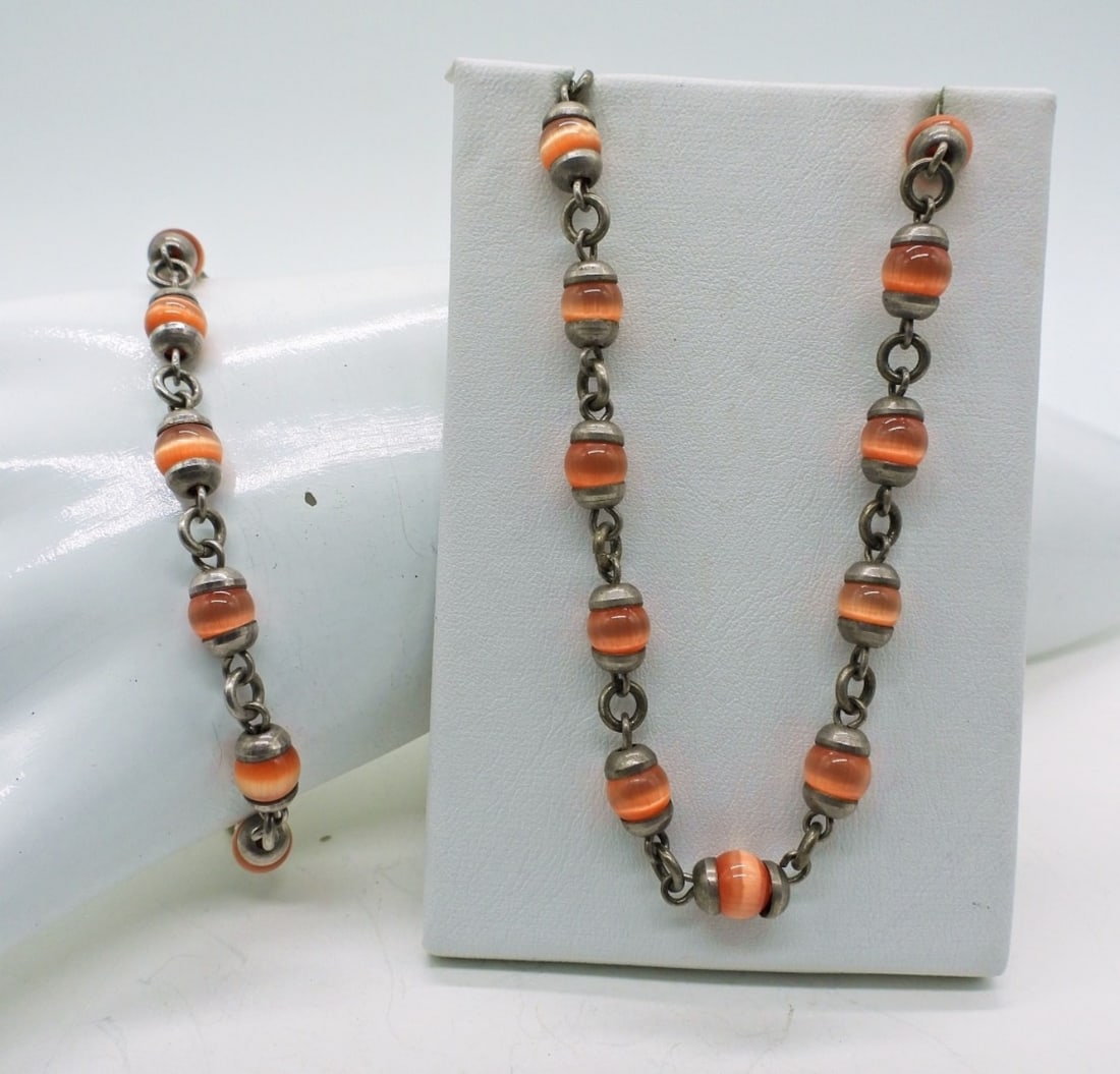 Sterling Orange Cats Eye Set: Vintage Sterling "Mexico 925" marked, Orange Cats Eye Necklace (17") and Bracelet (8"). 10 DWT
