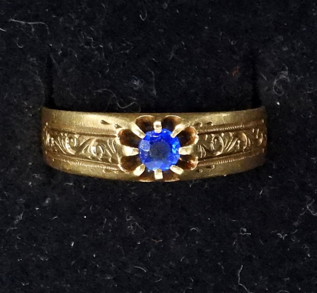 14K YELLOW GOLD ETCHED RING: GORGEOUS 14K YELLOW GOLD ETCHED BAND RING WITH BLUE GEMSTONE (GEMSTONE MAY OR MAY NOT BE GENUINE). SIZE 8.5-9. 1.9 DWT Not marked 14K, It was tested and tested as 14k!