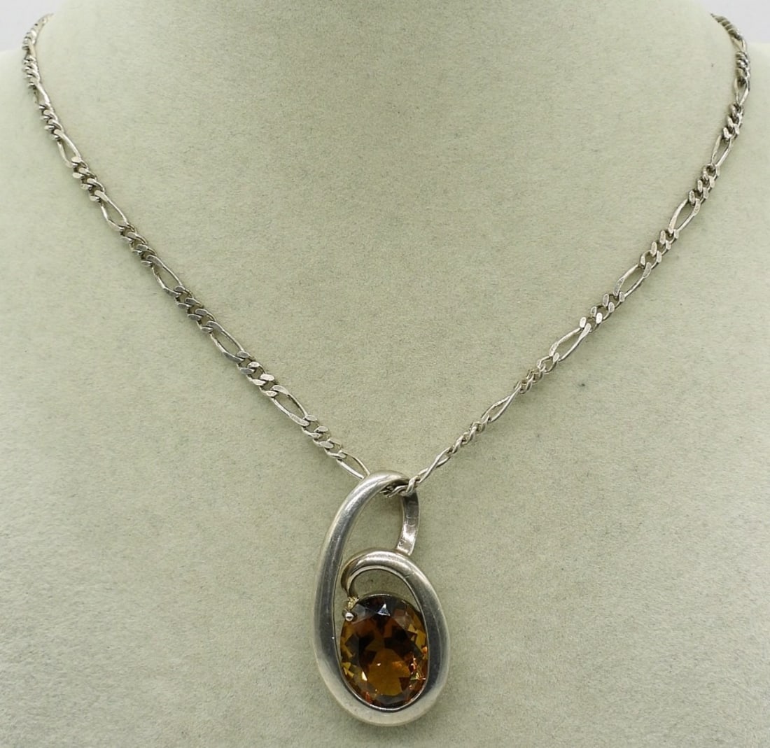 TOPAZ COLORED STERLING PENDANT & CHAIN: STERLING TOPAZ COLORED GEMSTONE PENDANT ON A 18". 9.2 DWT