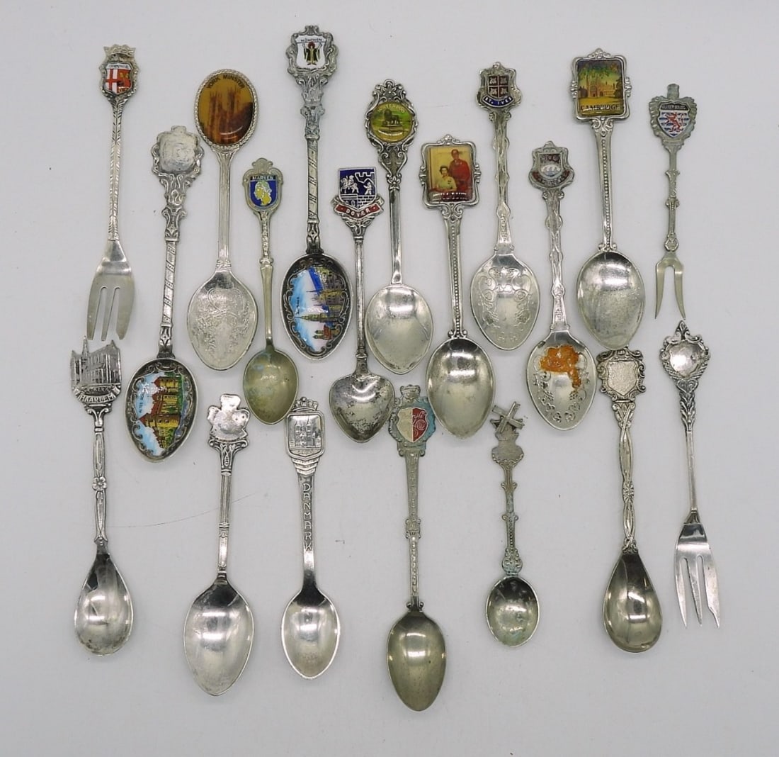 (19) COLLECTIBLE SPOONS & FORKS: NINETEEN SILVER TONE COLLECTIBLE SPOONS & MINI FORKS.