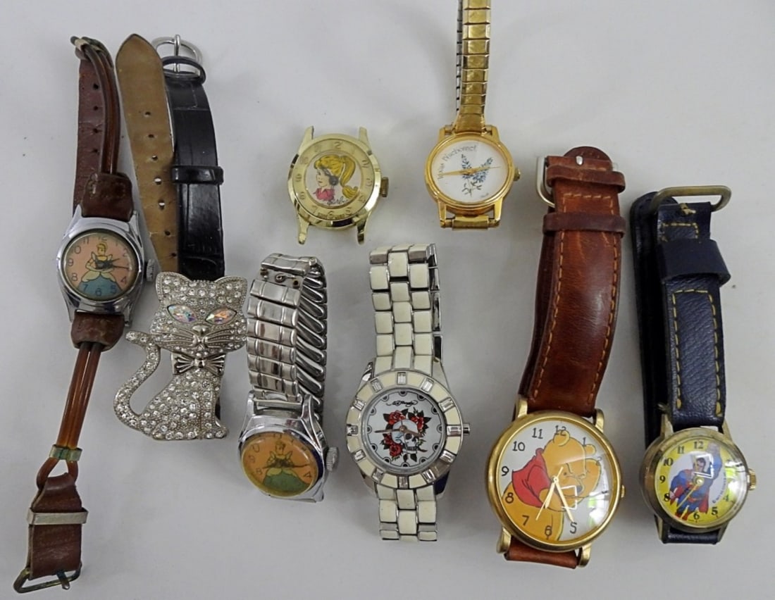 (8) LADIES NOVELTY WATCHES: UNTESTED, ED HARDY, SUPERMAN, WINNIE THE POOH, CINDERELLA, BLUE BONNET