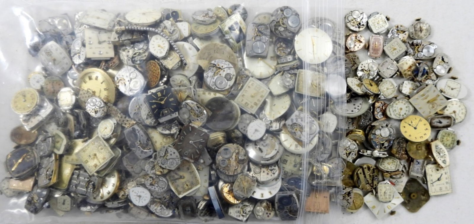 BAGGED FILLED WITH WATCH MOVEMENTS (1 of 2)