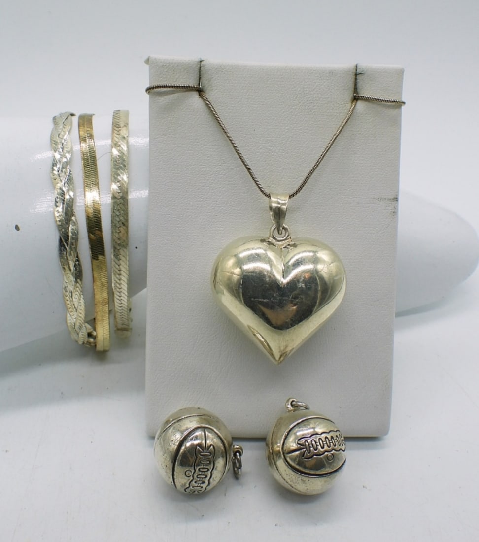 925 BASKETBALL PENDANTS & MORE: TWO STERLING BASKETBALL PENDANTS, HEART PENDANT ON AN 18" STERLING CHAIN, THREE STERLING CHAIN BRACELETS 7-8". 18 DWT