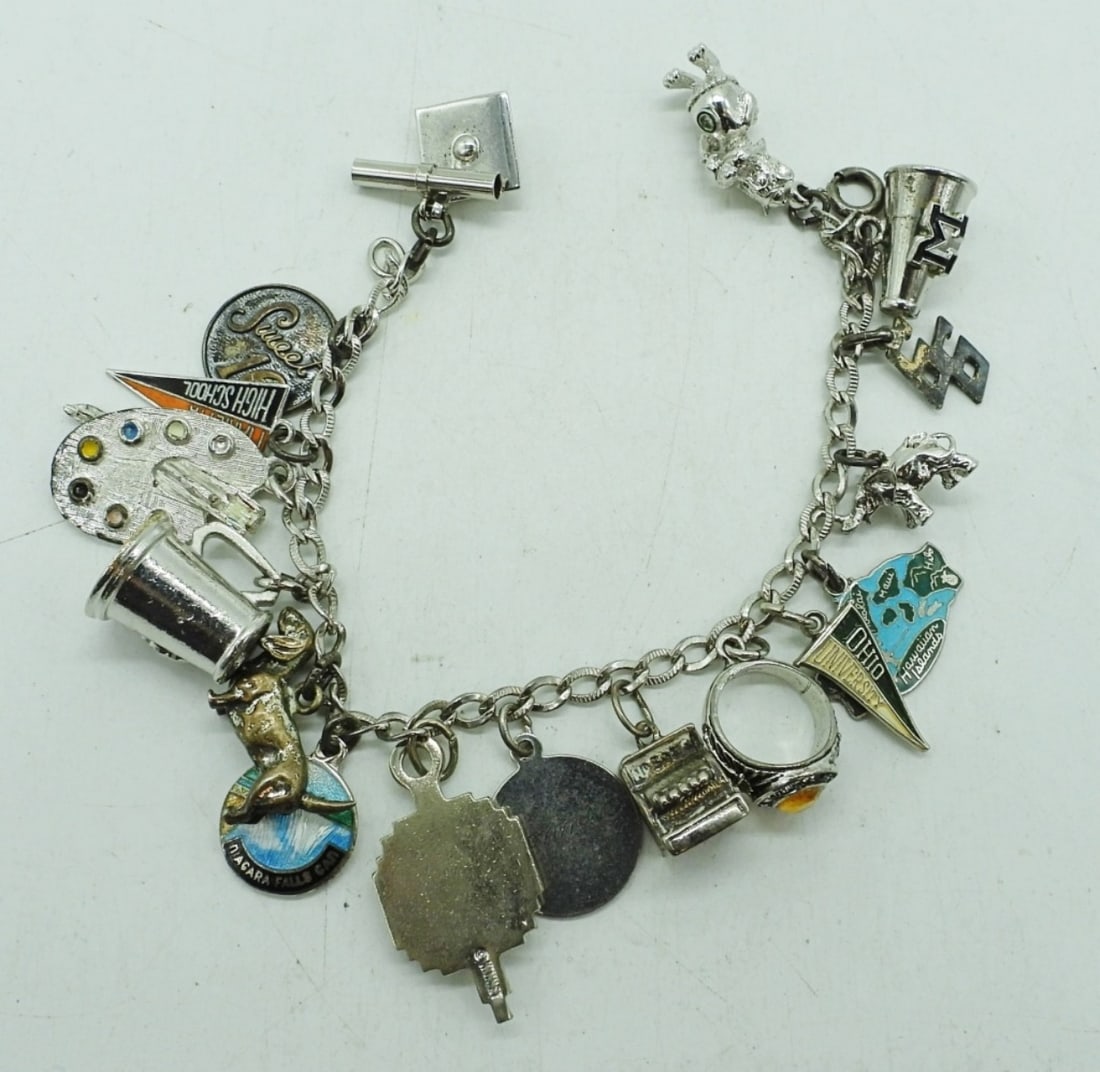 VINTAGE STERLING CHARM BRACELET: VINTAGE STERLING CHARM BRACELET, 17 CHARMS. 7". 30 DWT