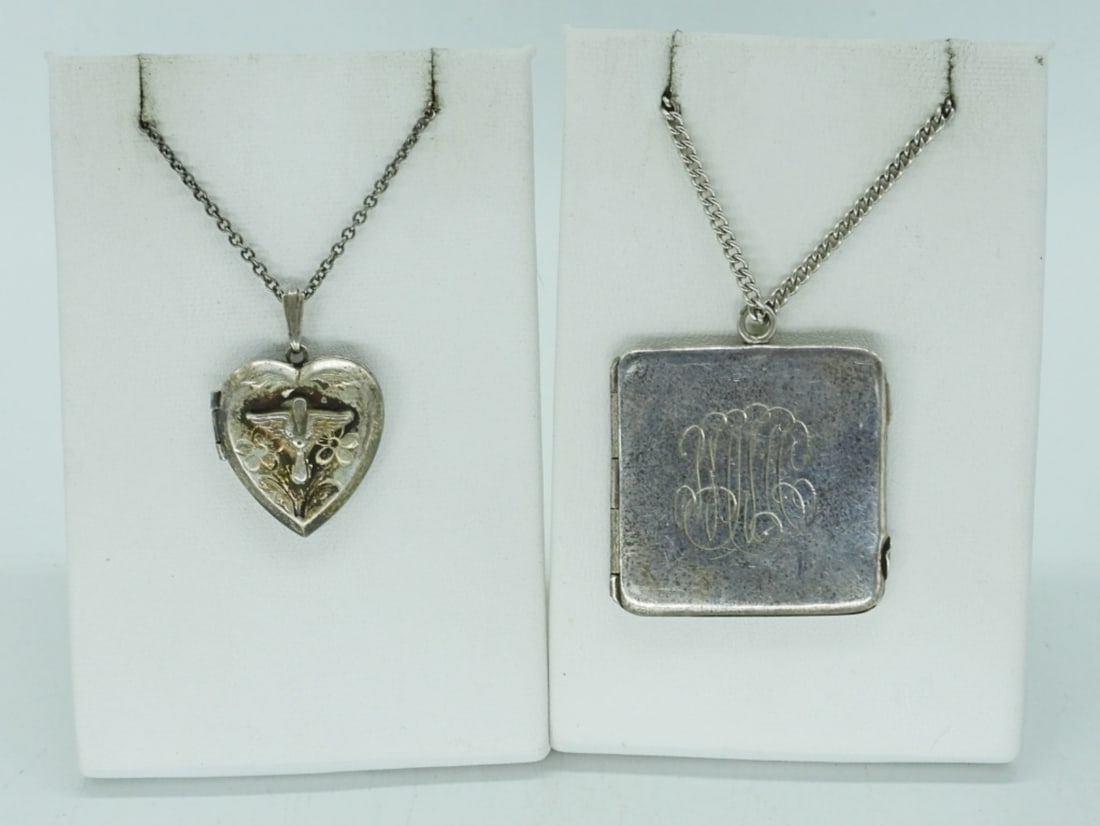 (2) VINTAGE STERLING LOCKETS: TWO VINTAGE STERLING LOCKETS. TARNISHED. CHAINS ARE 18" & 24". 14.5 DWT