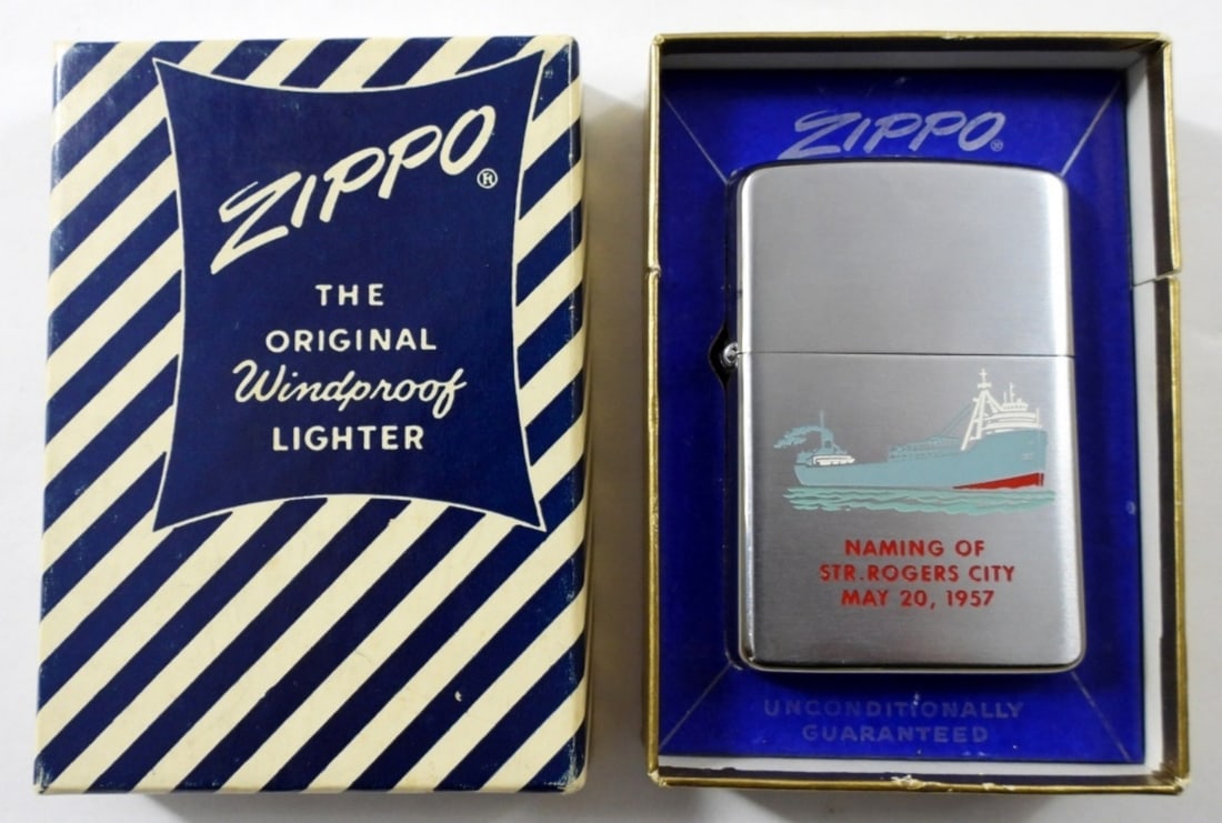 1958 UNFIRED CHROME ADVERTISING ZIPPO: 1958 UNFIRED CHROME ZIPPO LIGHTER PAT PEND (2517191 WITH MATCHING INSERT)WITH USS ( UNITED STATES STEEL) LOGO ON 1 SIDE AND NAMING OF STR. ROGERS CITY ON THE OTHER IN A ORIGINAL BLUE AND WHITE STRIPED