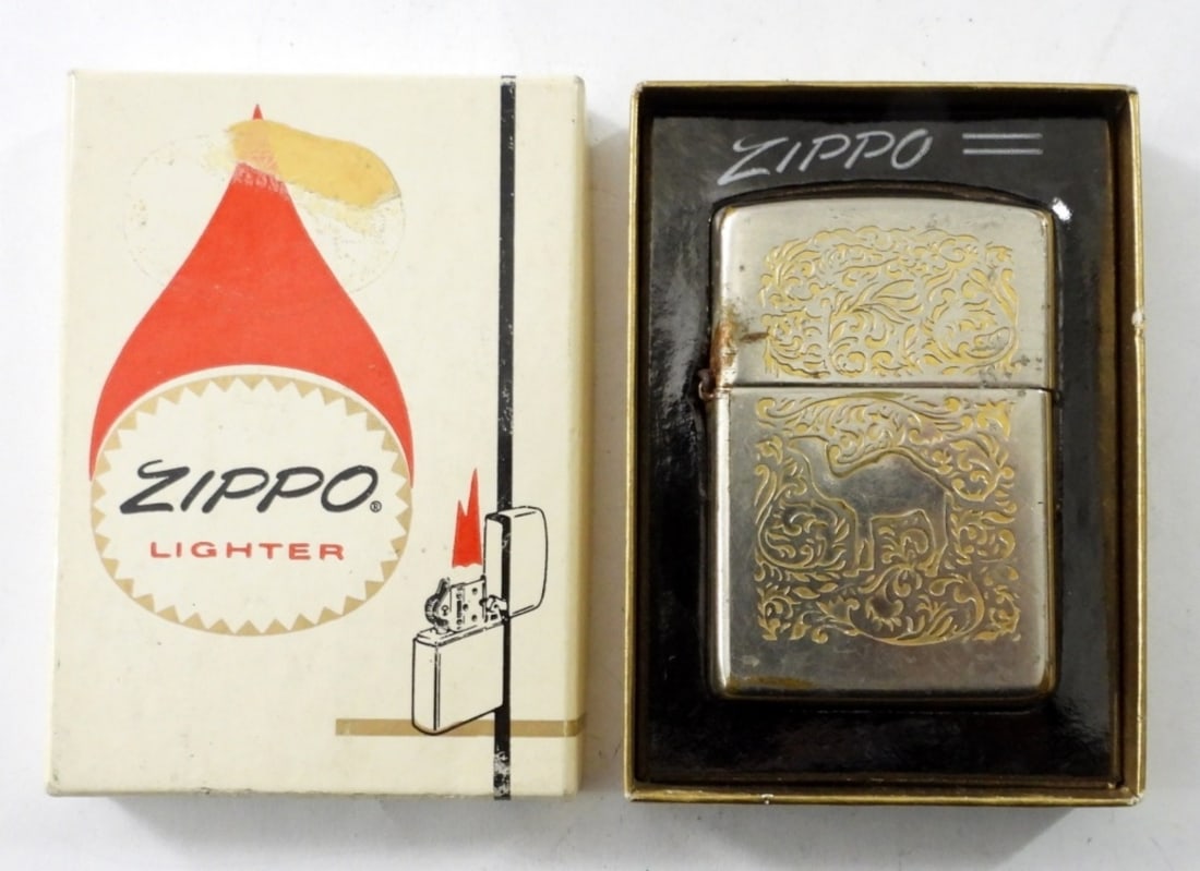 1995 FIRED CAMEL GOLD PLATED ZIPPO: 1995 FIRED CAMEL GOLD PLATED ZIPPO ( SLIGHT RUST INSIDE) IN BOX