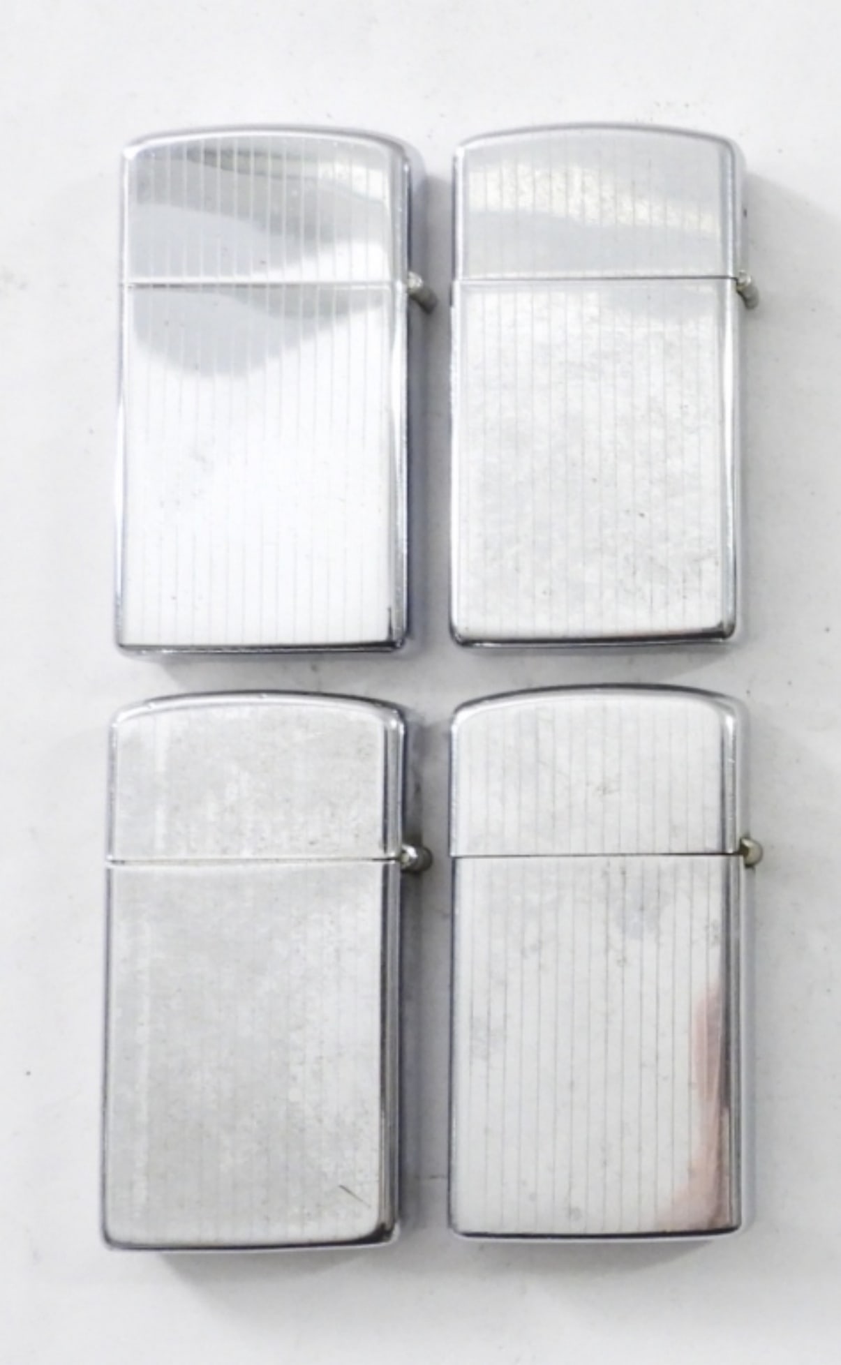 (4) ART DECO LINES SLIM ZIPPOS (1 of 4)