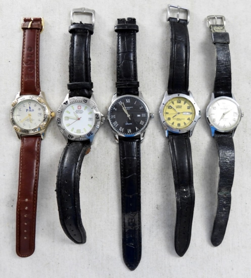 (5) LEATHER BAND MENS DATE WATCHES: (5) LEATHER BAND MENS DATE WATCHES 4 BLACK LEATHER BANDS AND 1 BROWN BAND.POLO, WENGER & MORE( NOT TESTED AS TO WORKING OR NOT )