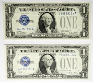 (2) 1928 A $1 SILVER CERTS (FUNNY BACK) AU+