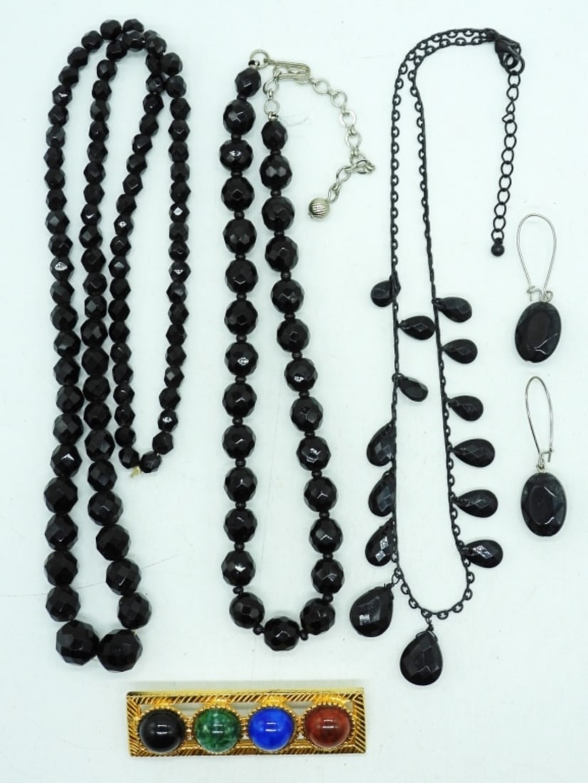 BLACK BEADED VINTAGE NECKLACES & MORE: THREE BLACK BEADED VINTAGE NECKLACES, 16, 18, 24". ONE PAIR OF PIERCED EARRINGS & A BROOCH.
