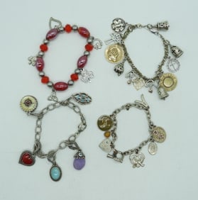 (4) COSTUME CHARM BRACELETS