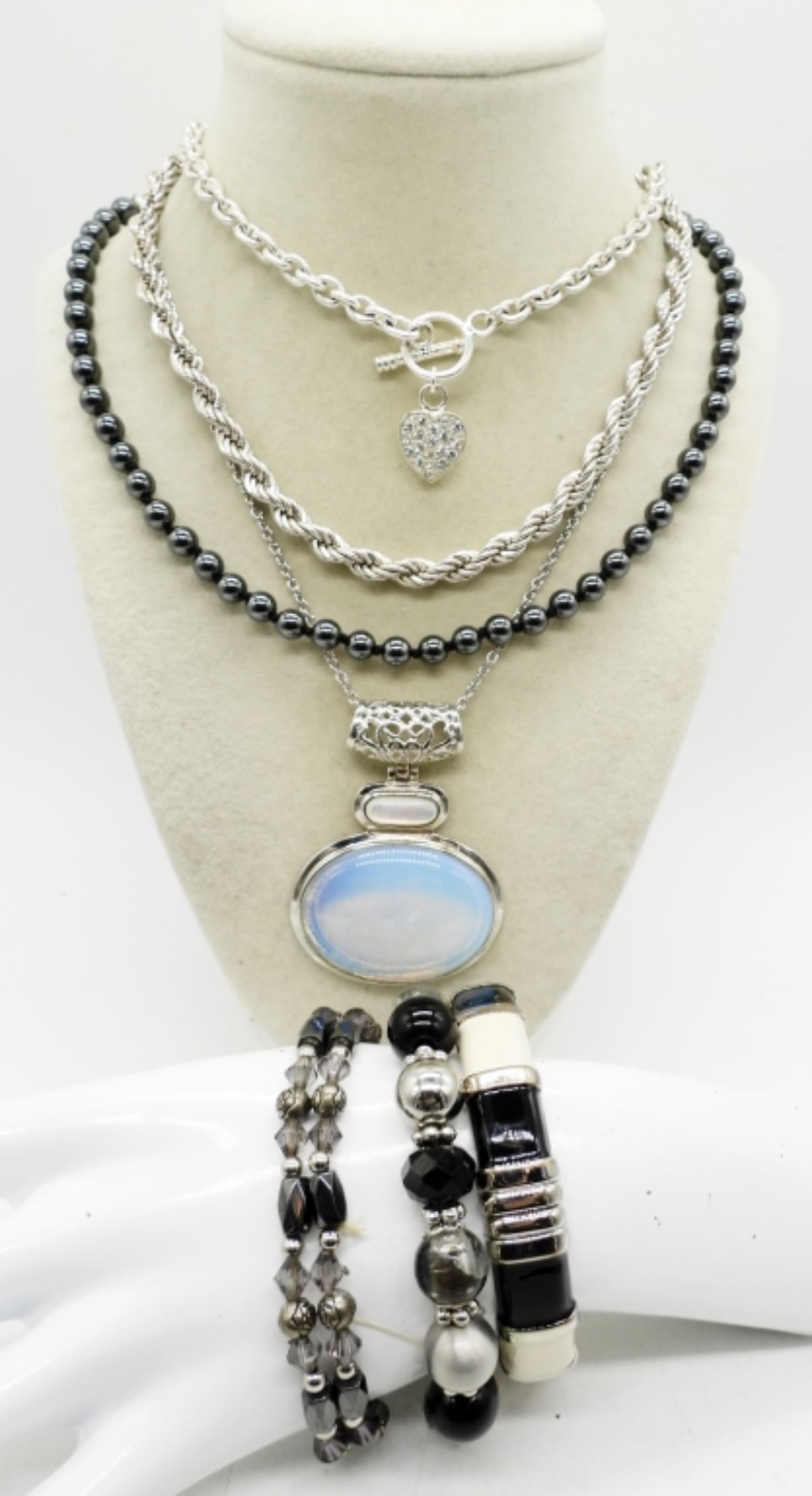 BLACK & SILVER NECKLACE BRACELET LOT: FOUR NECKLACES, 14"-24". FOUR BRACELETS, 3 STRETCHY & 1 BANGLE.