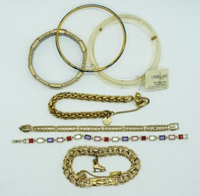 (7) FASHION GOLD TONE BRACELETS