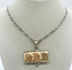 BONE PENDANT WITH BUNNIES