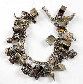 STERLING CHARM BRACELET WITH 27 CHARMS
