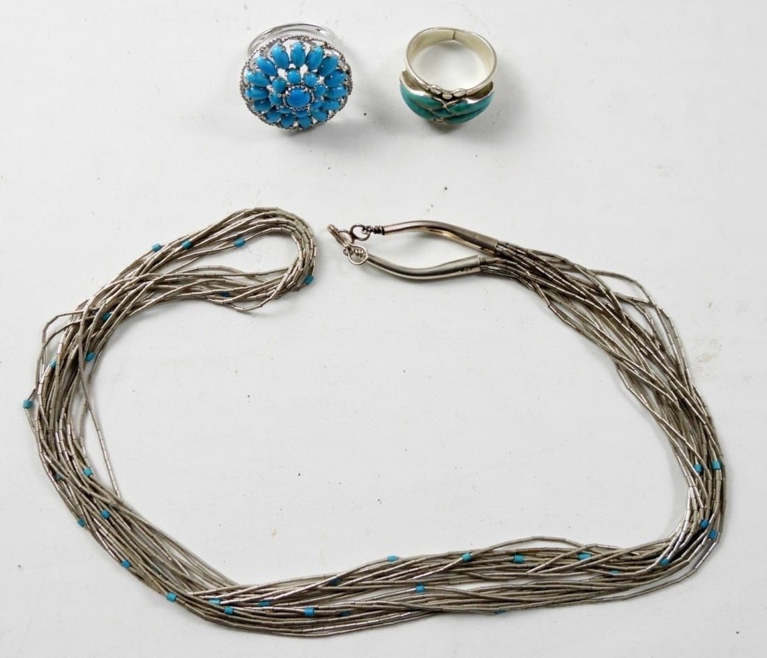 LADIES LIQUID STERLING NECKLACE AND RINGS: LADIES 26" LIQUID STERLING NECKLACE AND 2 RINGS SIZE 7 BOTH WITH BLUE GEMSTONES (15.1 DWT)