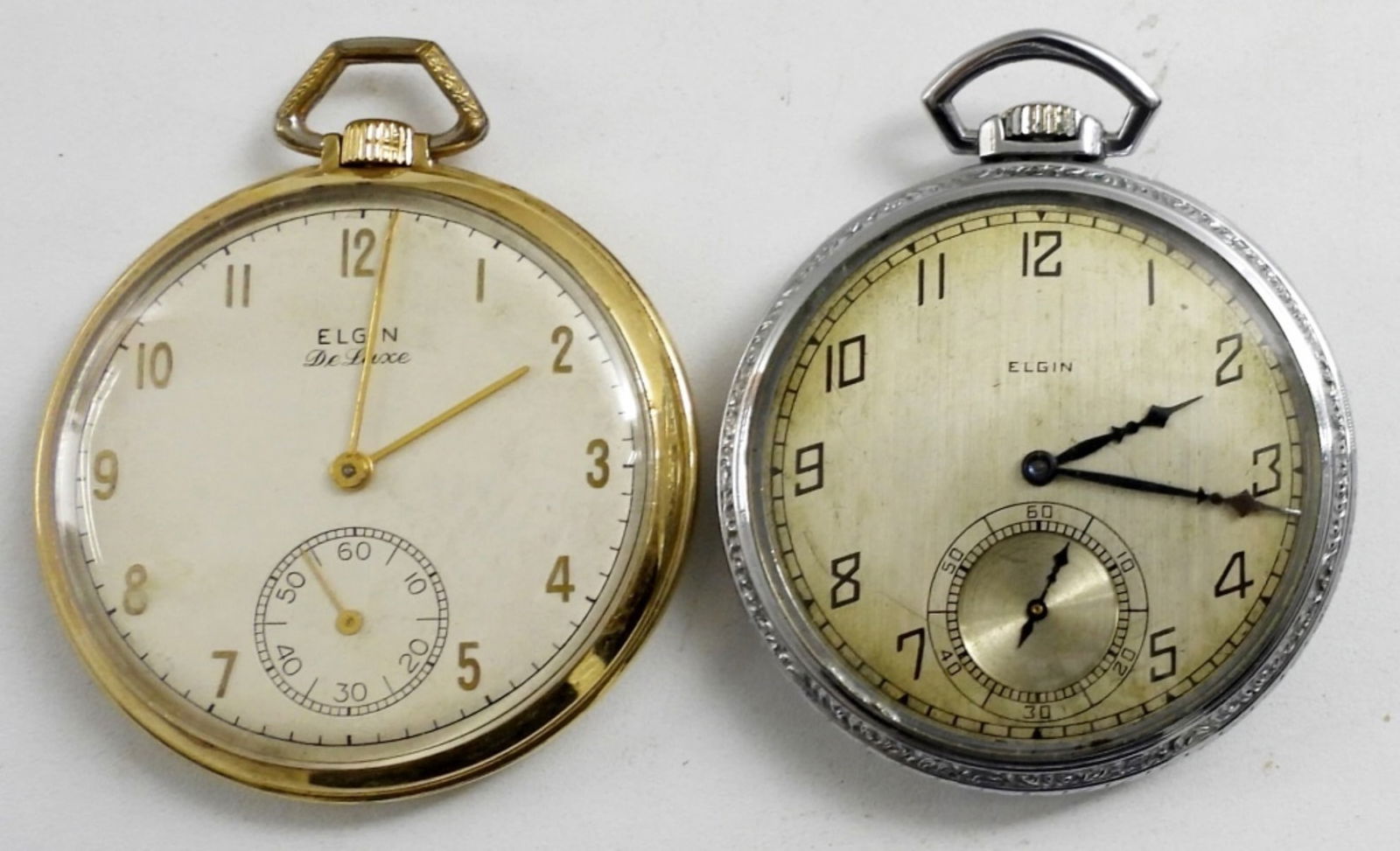 (2) ELGIN 12 SIZE POCKET WATCHES - RUNS: NEEDS SERVICED (1) SILVER TONE SERIAL #28159086, 15j & (1) GOLD TONE DE LUXE