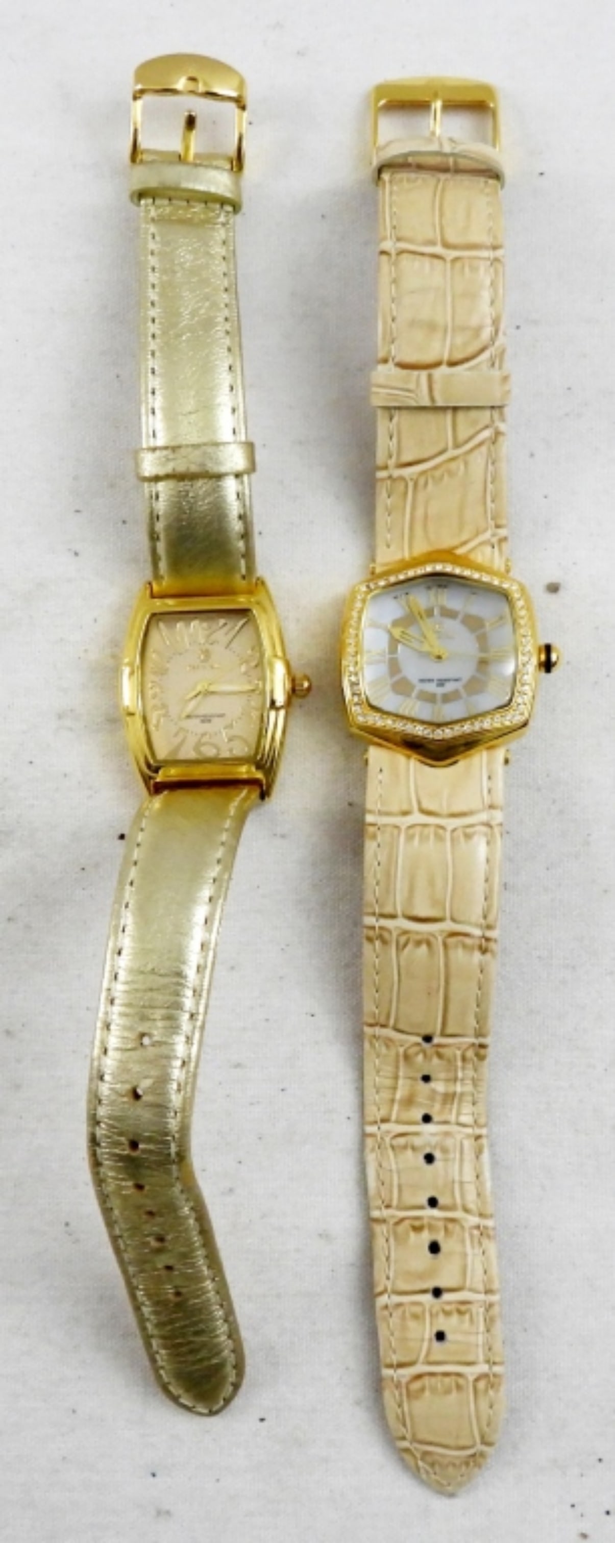 (2) PASTORELLI BY INVICTA LADIES WATCHES: ONE GOLD TONE LEATHER, ONE TAN LEATHER BANDED PASTORELLI WATCHES. GOLD TONE FACES. -NOT TESTED AS TO WORKING OR NOT-