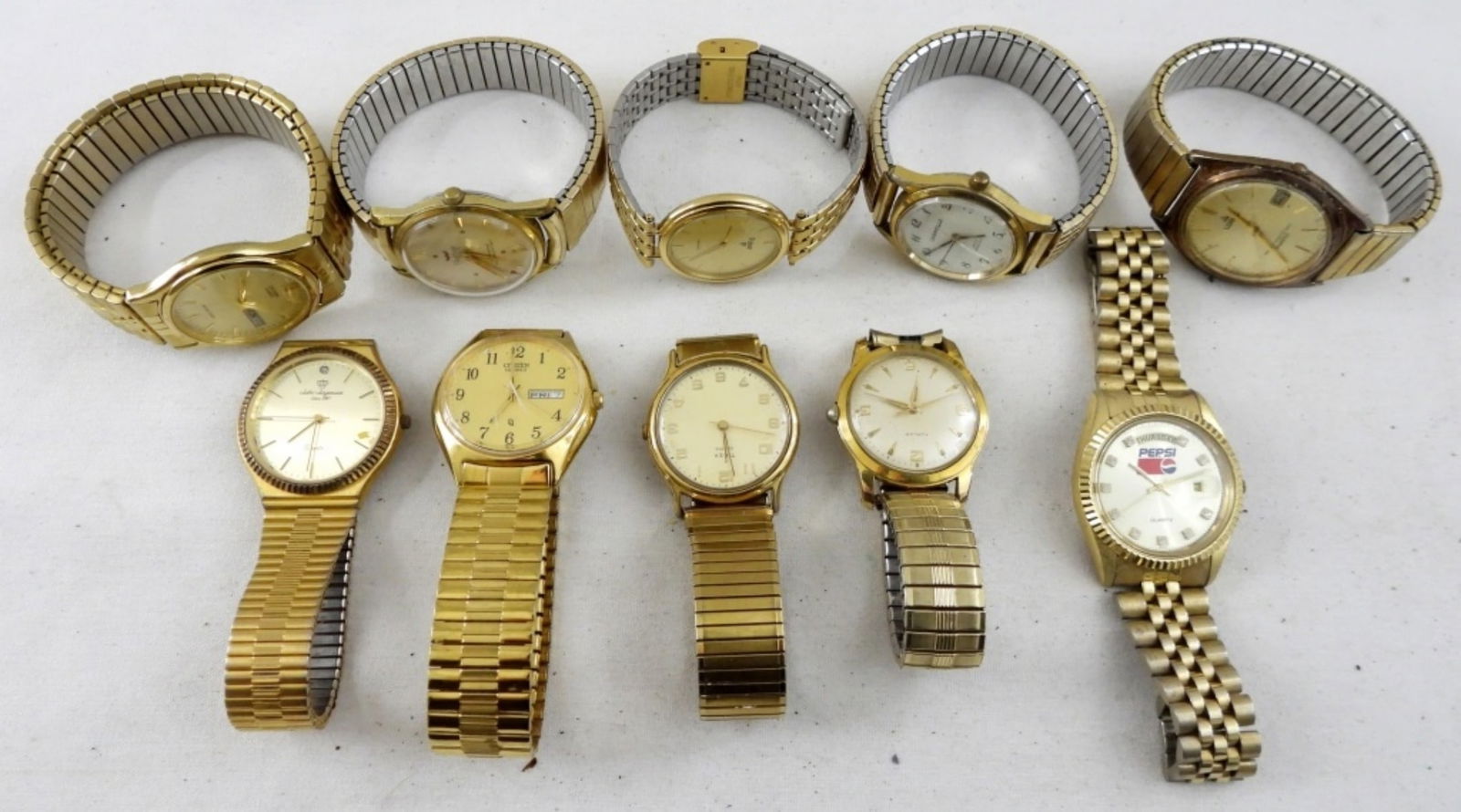 (10) GOLD TONE MEN'S WATCHES: TEN GOLD TONE MEN'S WRIST WATCHES. CITIZEN, TIMEX, JULES JURGENSEN, PULSAR, PEPSI, LORUS & MORE. -NOT TESTED AS TO WORKING OR NOT!-