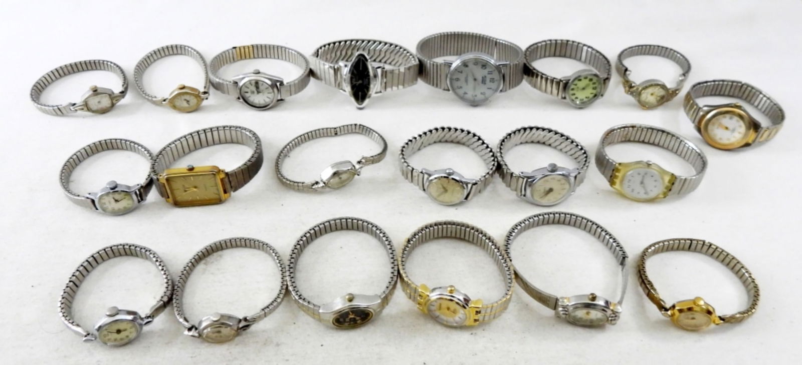 20 SILVER TONE LADIES STRETCH WATCHES (1 of 2)